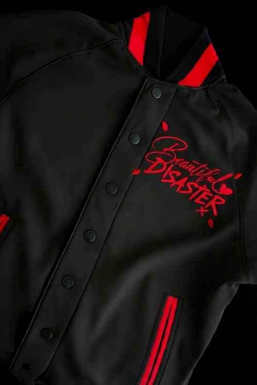 Black jacket with red accents and 'Beautiful Disaster' text on a dark background